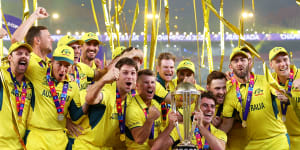 Pat Cummins and the Australians celebrate their World Cup win.