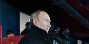 In more confident times:Putin stands during the opening ceremony of the 2022 Winter Olympics in Beijing. 