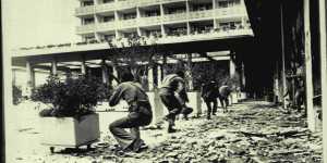 Gunmen by the pool at the Phoenicia fire at opponents in the nearby Holiday Inn in the first year of civil war in 1975.