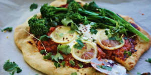Spicy harissa,broccolini and lemon pizza with cooling whipped feta.