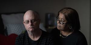 Garry Keeping,with his wife Kamal,was diagnosed with COVID on July 18. Three months later he is still experiencing lingering effects,including hand tremors,forgetfulness and fatigue. 