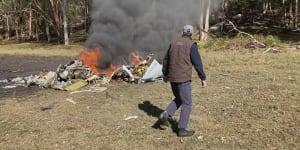 ‘Clearly not survivable’:pilot dead after helicopter crash in Sydney’s north-west