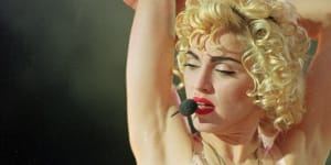 Madonna performing the Blond Ambition tour in London in 1990.