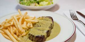 Signature dish:Steak,green salad with dijon vinaigrette and bottomless fries. Entrecote South Yarra