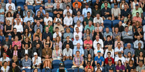 The Australian Open has drawn record crowds. Spectators watch the men’s singles quarter-finals between Novak Djokovic and Andrey Rublev at Rod Laver Arena.