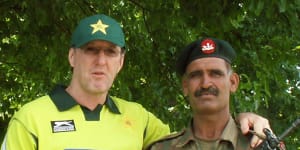 Geoff Lawson with security detail during his time as Pakistan coach.