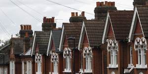 Chimney pots line the rooftops of houses in the Herne Hill district of London.
