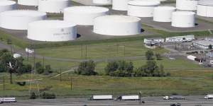 Oil storage tanks owned by the Colonial Pipeline Company in Linden,New Jersey,that transports fuels along the East Coast says it had to stop operations because it was the victim of a cyberattack. 