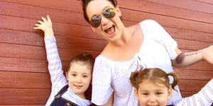Rachel van Oyen with her twin daughters,Macey and Riley.