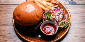 The signature burger is a fine example of the genre.