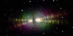 The Egg Nebula is a rapidly evolving pre-planetary nebula spanning about one light year toward the constellation of Cygnus. Thick dust blocks the centre star from view,while the dust shells further out reflect light from this star.
