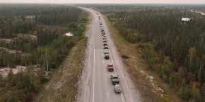 Yellowknife residents leave the city on Thursday using the only highway in or out of the community,after an evacuation order was issued.
