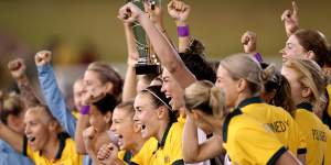 The Matildas lift the Cup of Nations trophy as they continue their preparations for the World Cup.