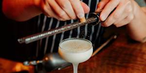 Add a flourish to your festive cocktail,either nutmeg or cinnamon.