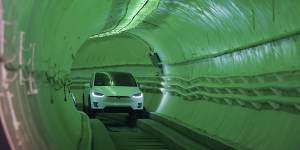 A Tesla Model X carrying Elon Musk in a Boring Company test tunnel in California.