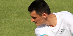 Tomic's fine trimmed,but board slams Aussie over tanking