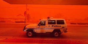 Dust storm paints the town red in south-west Queensland