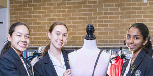 Year 12 Santa Sabina College students Lucia Juarez (left),Lucy Gee (centre),and Rochelle Dias are part of a group running their own op shop.