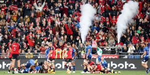 A sold-out crowd watched the clash between the Crusaders and the Blues in Christchurch.