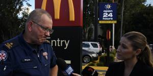 Liverpool-based paramedic Wayne Havenaar pays his respects to his colleague who was fatally stabbed in a car park at a McDonald’s in Campbelltown. 