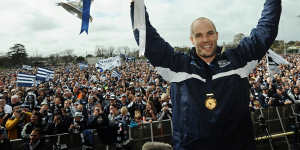 Sydney CEO Tom Harley held up two premiership cups as Geelong captain