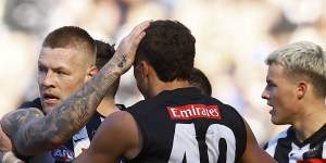 Jordan De Goey celebrates a goal with Ash Johnson.