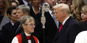 Bishop Mariann E. Budde with Trump,whom she challenged to “have mercy” on those who were frightened.