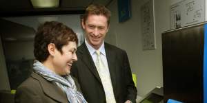 The then transport minister,Lynne Kosky,tests a myki ticket machine in 2008.