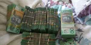 Photos extracted from Philip Uy’s phone showing bundles of cash have been tendered to the ICAC.