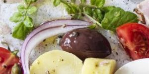 Never toss a nicoise - ingredients should be composed with an eye for colour and contrast.