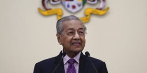 Malaysian interim leader Mahathir Mohamad speaks during a press conference on Thursday.