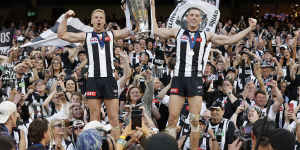 Billy Frampton and Darcy Cameron of the Magpies celebrate.