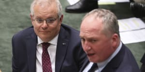 Prime Minister Scott Morrison,left with Barnaby Joyce,told Parliament on Monday he would stick with the target that he took to the 2019 election.