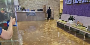 Hotel guests had to wade through water,which tourist Michael Watson compared to scenes from the movie Titanic.