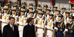 Distracted by Macron’s visit,Beijing shows restraint on Tsai US visit