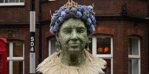 A floral display paying homage to the Queen outside the Sloane Club and Sloane Place,in London.