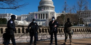 US Capitol police officers stand guard near Washington on Saturday.