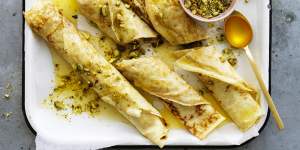 Baklava-ish honey and pistachio filled crepes.