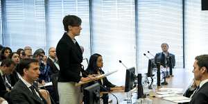 Rowena Orr flanked by Mark Costello and Eloise Dais at the royal commission this week. 