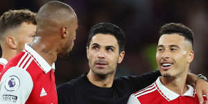Arsenal manager Mikel Arteta celebrates with his players after the Gunners maintained their perfect start to the season.
