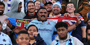 Apolosi Ranawai with friends and family in the stands after his debut.