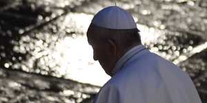 Pope Francis walks during Urbi and Orbi prayer in an empty St. Peter's Square,at the Vatican last weekend.
