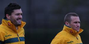 Ashley-Cooper and Giteau warm up at Wallabies training in 2011.