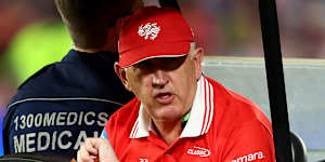 Kyle Flanagan is taken from the field after being knocked out against the Titans.