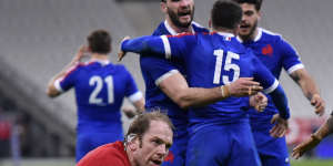 Alun Wyn Jones of Wales reacts as Brice Dulin of France celebrates his winning try with Charles Ollivon during the Guinness Six Nations match between France and Wales at Stade de France on March 20,2021 in Paris,France.