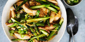 Spring stir-fry with chicken fillets and asparagus spears.