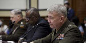 From left,US General Mark Milley,Secretary of Defence Lloyd Austin and Marine Corps General Kenneth McKenzie testify before the House Armed Services Committee on Wednesday.