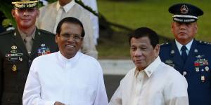 Like-minded:Sri Lanka President Maithripala Sirisena,left,and Philippine President Rodrigo Duterte shake hands in Manila last month.