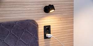 It’s been 20 years … Enough time for hotels to make power points available by the bed.