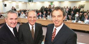 Then Irish prime minister Bertie Ahern,US senator George Mitchell and British prime minister Tony Blair pose after signing the Good Friday Agreement for peace in Northern Ireland in 1998.